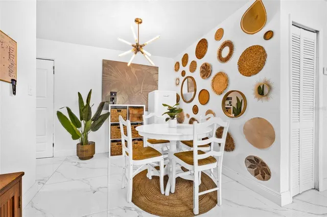 a vase of flowers sitting on a table