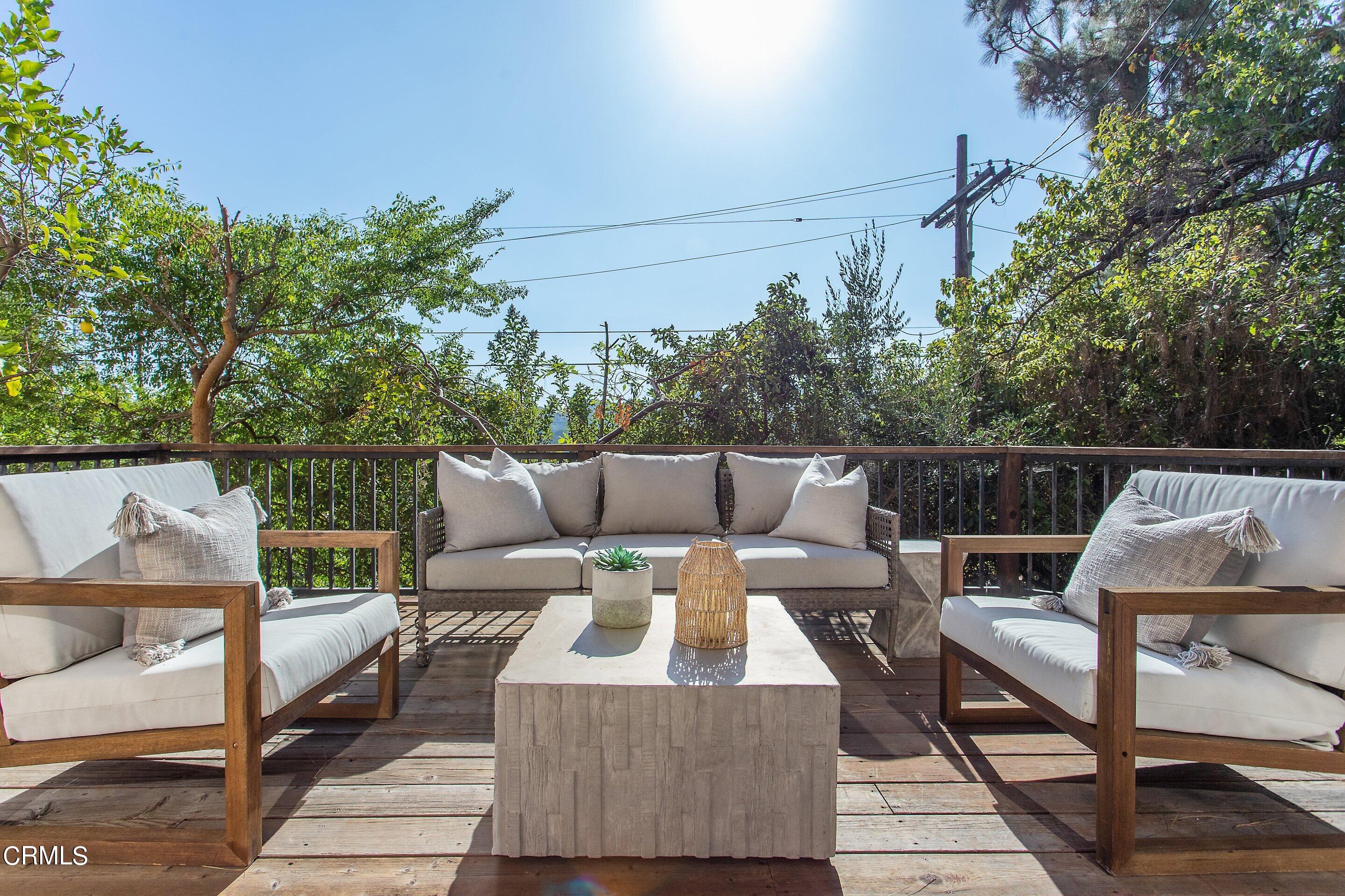 3170 Buckingham Road Glendale, CA 91206 - Photo 21 of 47 a roof deck with table and chairs