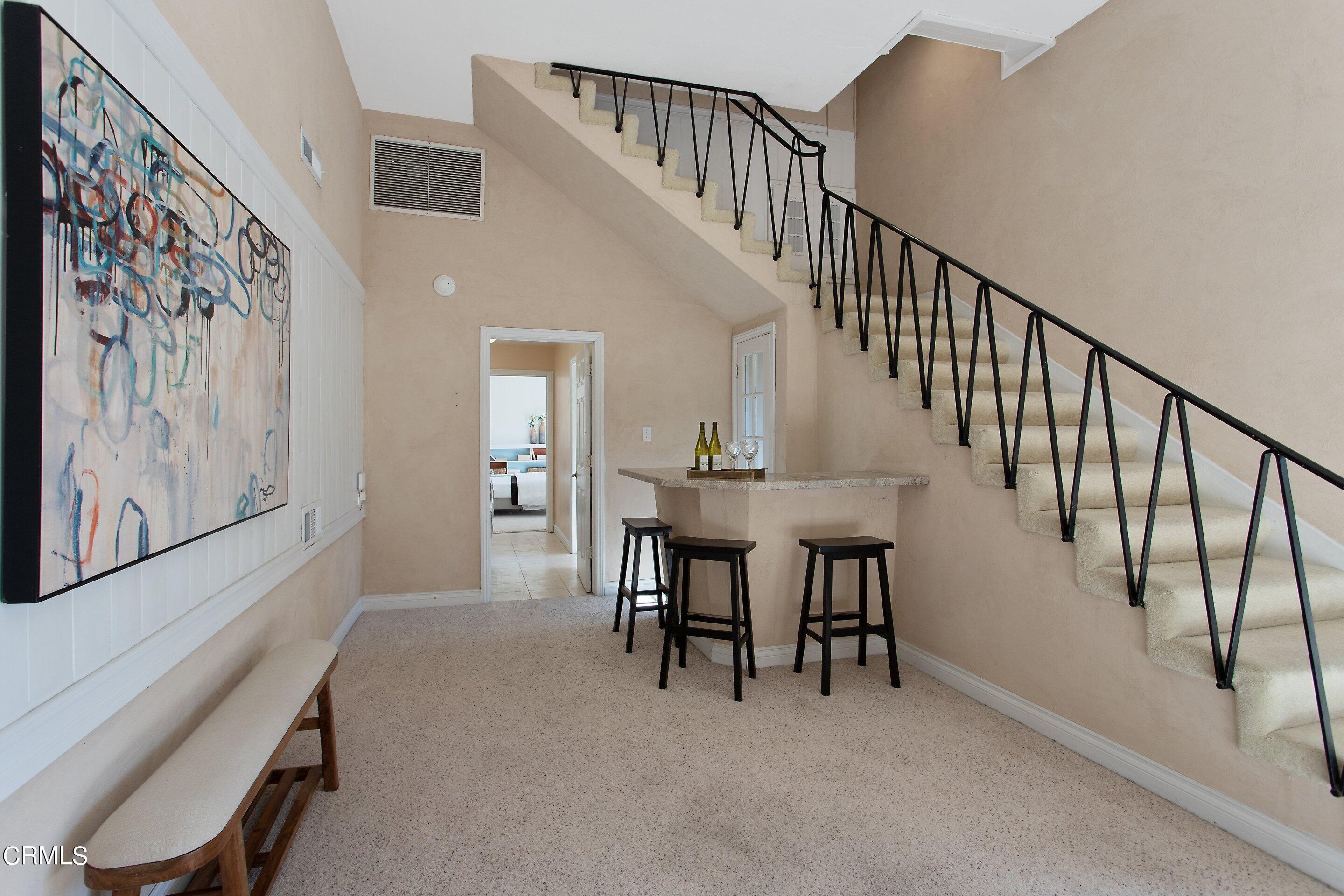 3170 Buckingham Road Glendale, CA 91206 - Photo 28 of 47 a view of a livingroom with furniture and stairs