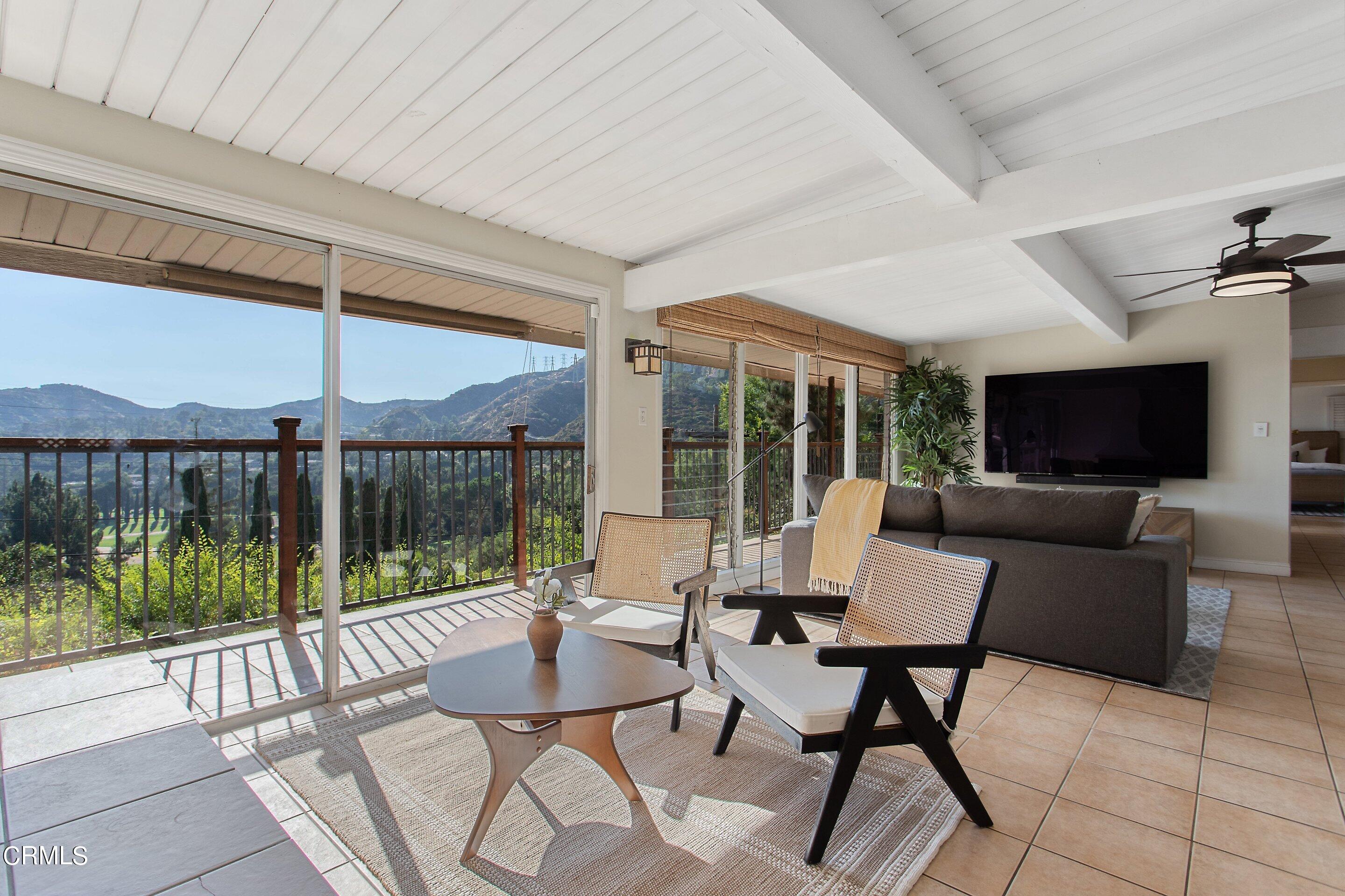 3170 Buckingham Road Glendale, CA 91206 - Photo 3 of 47 a outdoor space with a large window and couch