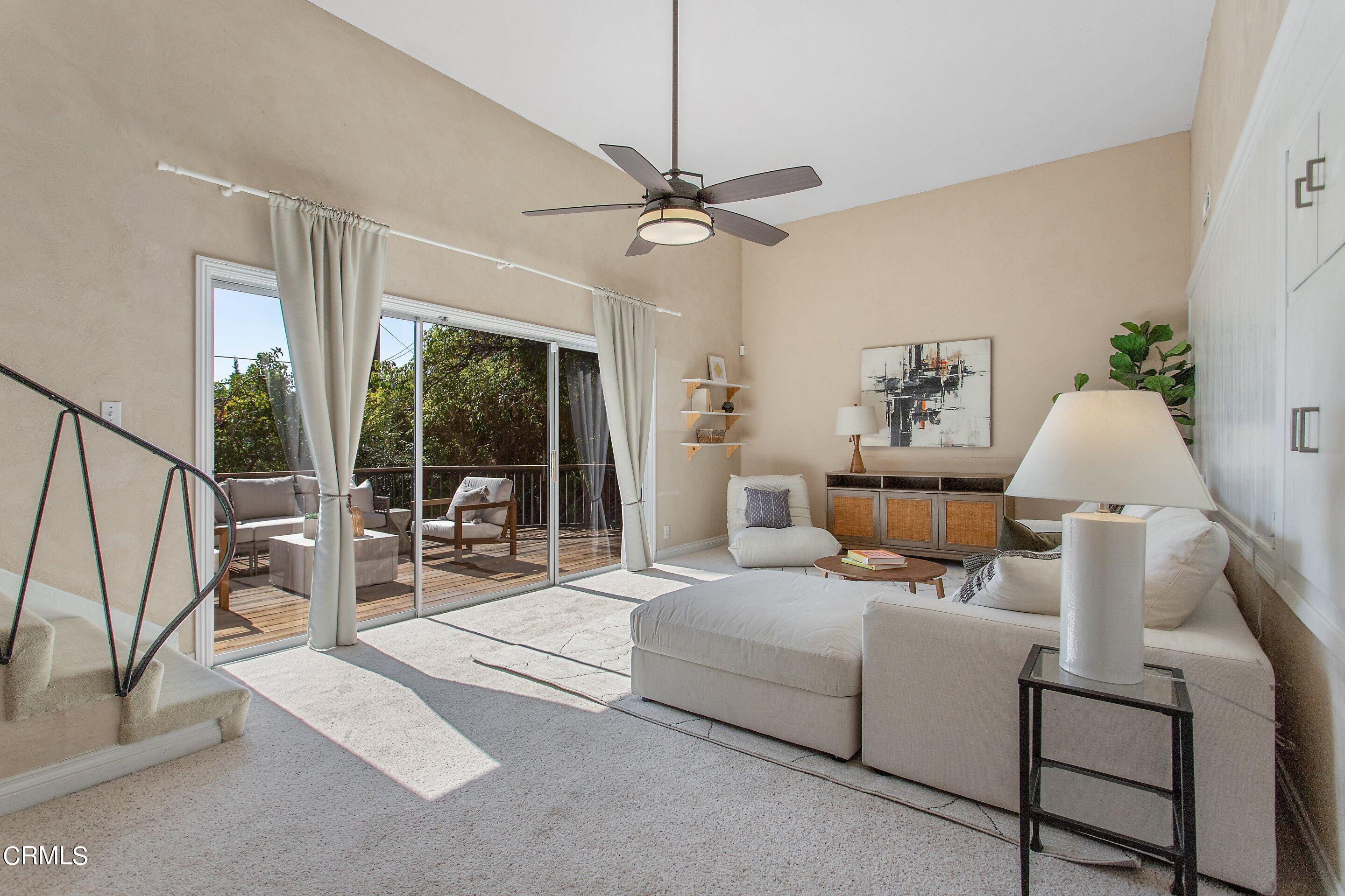 3170 Buckingham Road Glendale, CA 91206 - Photo 31 of 47 a living room with furniture and a window
