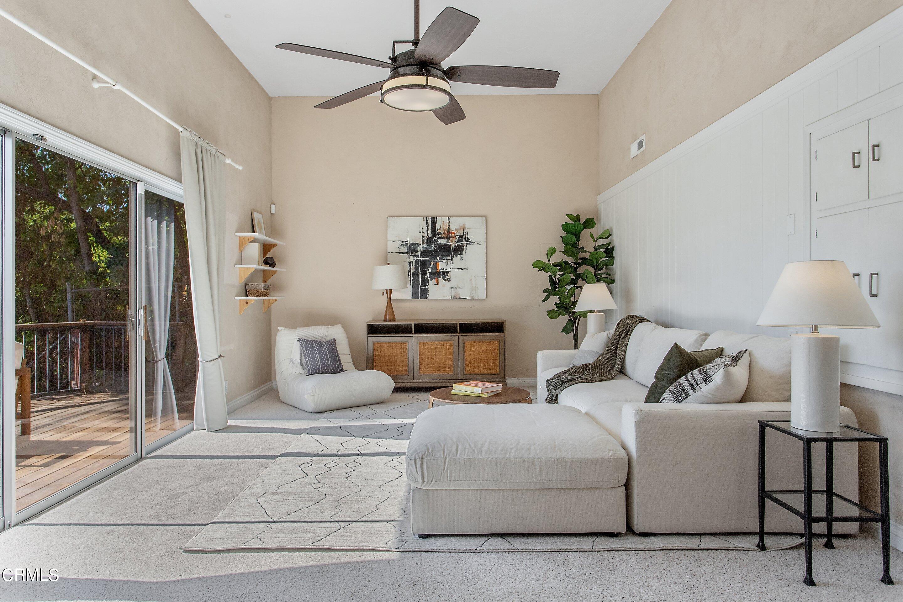 3170 Buckingham Road Glendale, CA 91206 - Photo 32 of 47 a bedroom with furniture and a ceiling fan