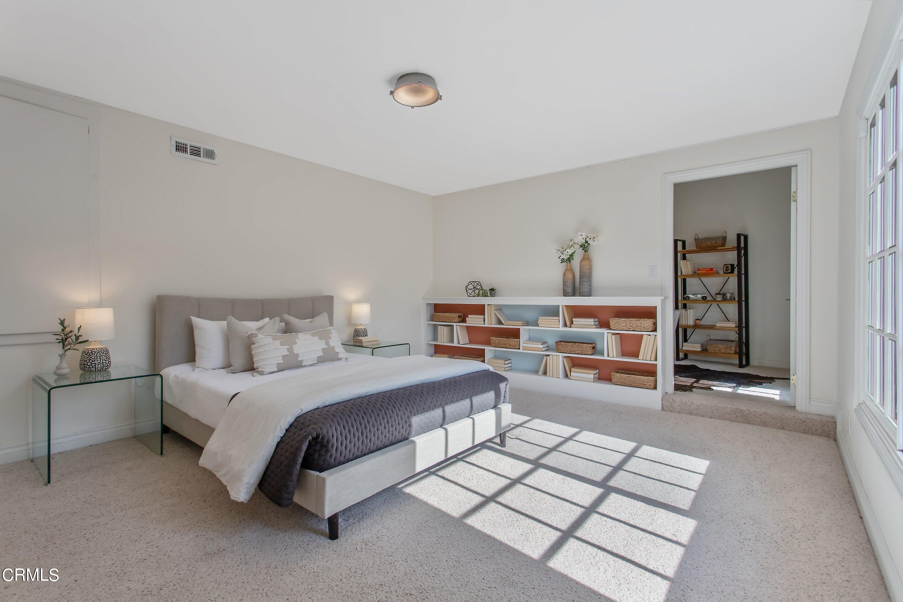 3170 Buckingham Road Glendale, CA 91206 - Photo 33 of 47 a bedroom with a bed and a cabinets