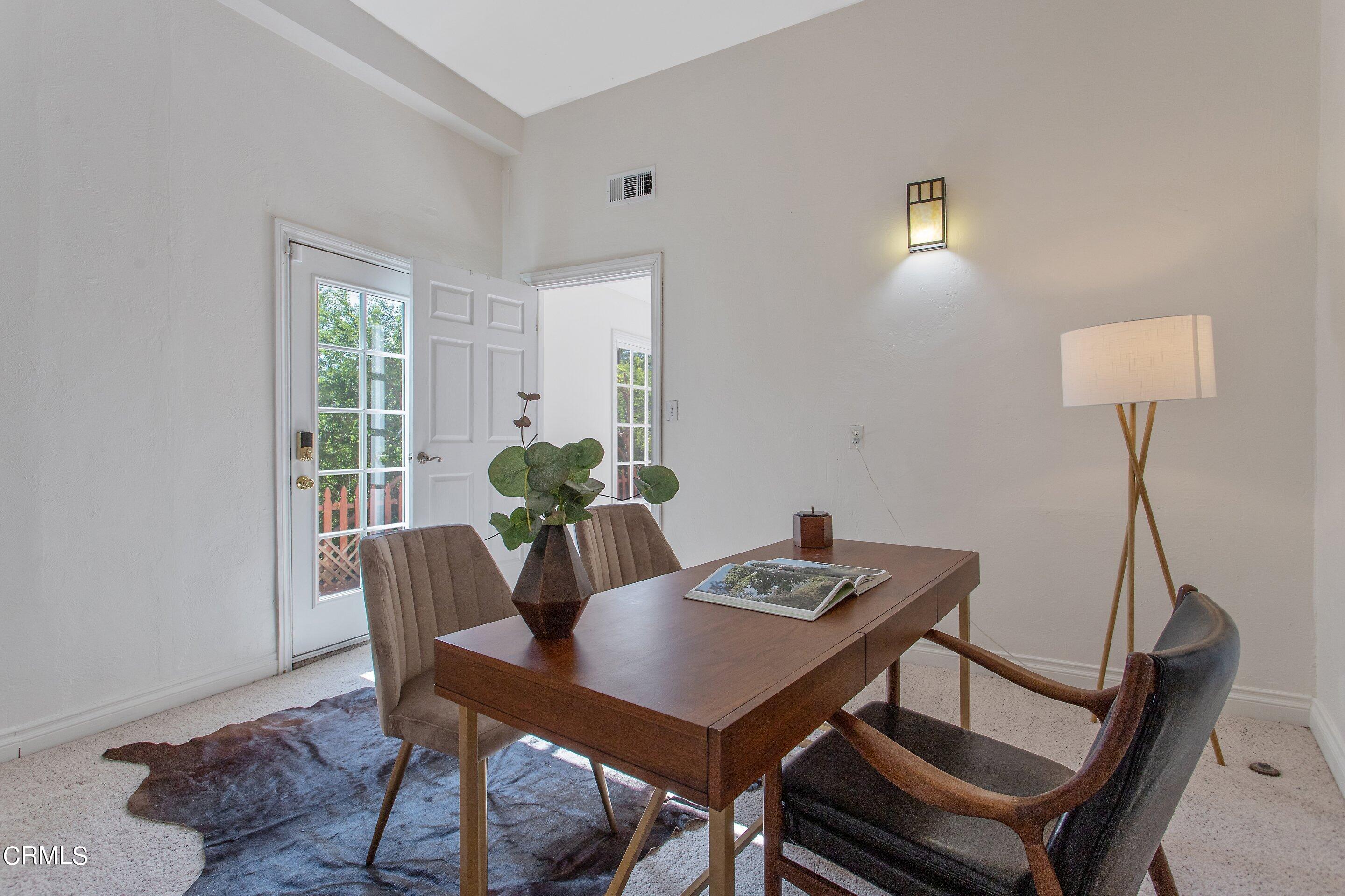 3170 Buckingham Road Glendale, CA 91206 - Photo 38 of 47 a view of a dining room with furniture window and wooden floor