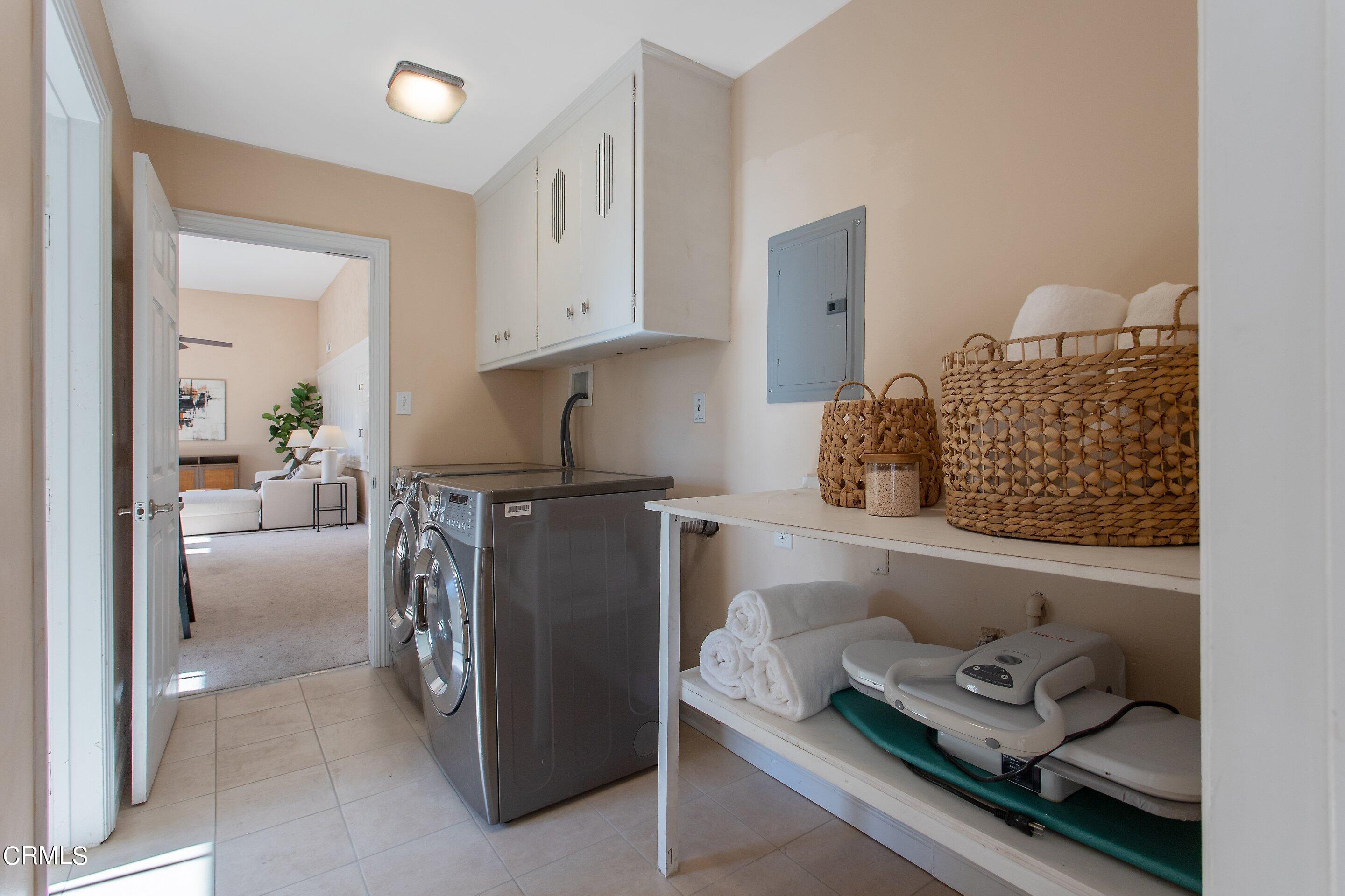 3170 Buckingham Road Glendale, CA 91206 - Photo 39 of 47 a kitchen with a refrigerator and cabinets