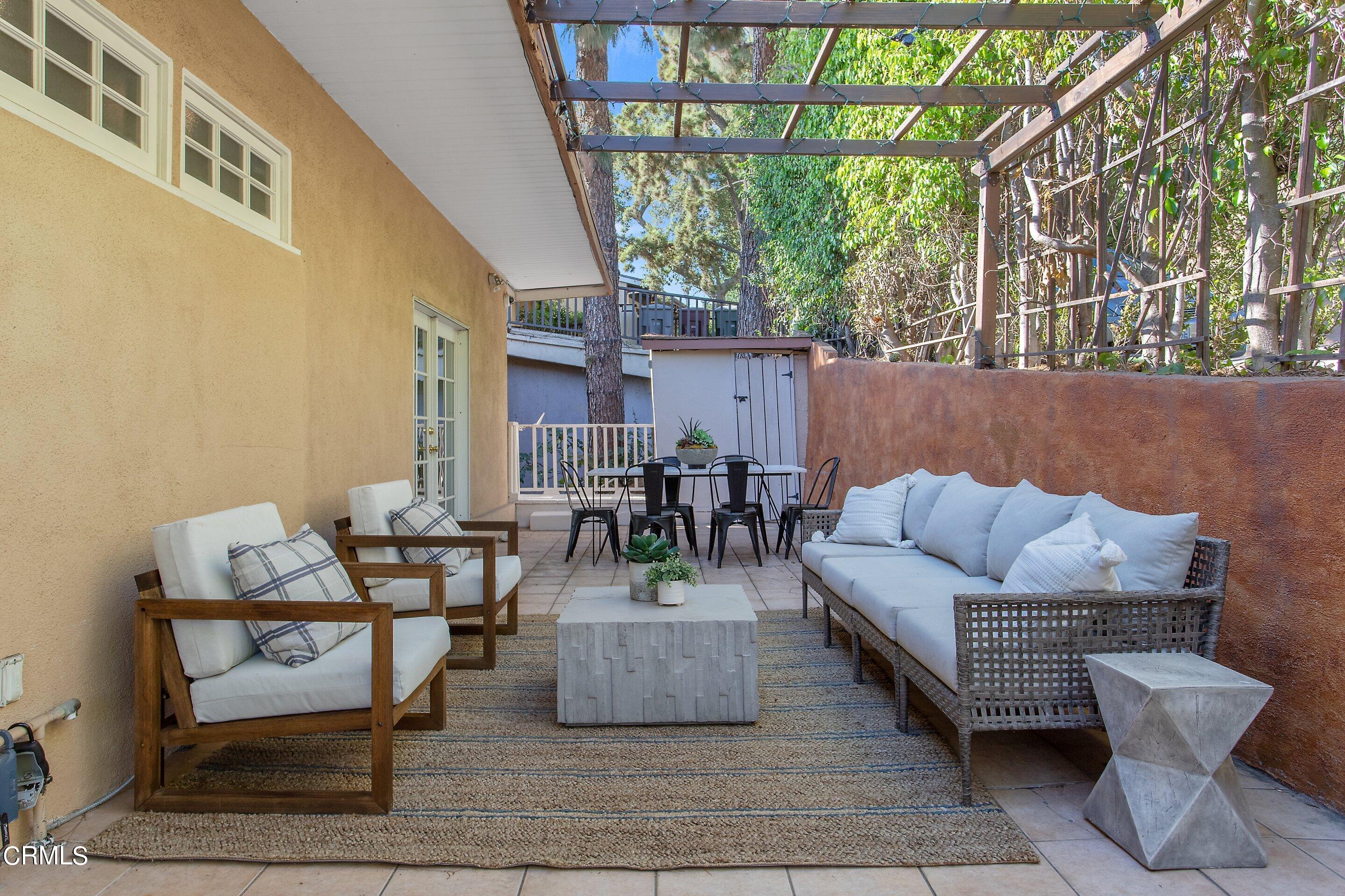 3170 Buckingham Road Glendale, CA 91206 - Photo 42 of 47 a view of a patio with couches and table and chairs