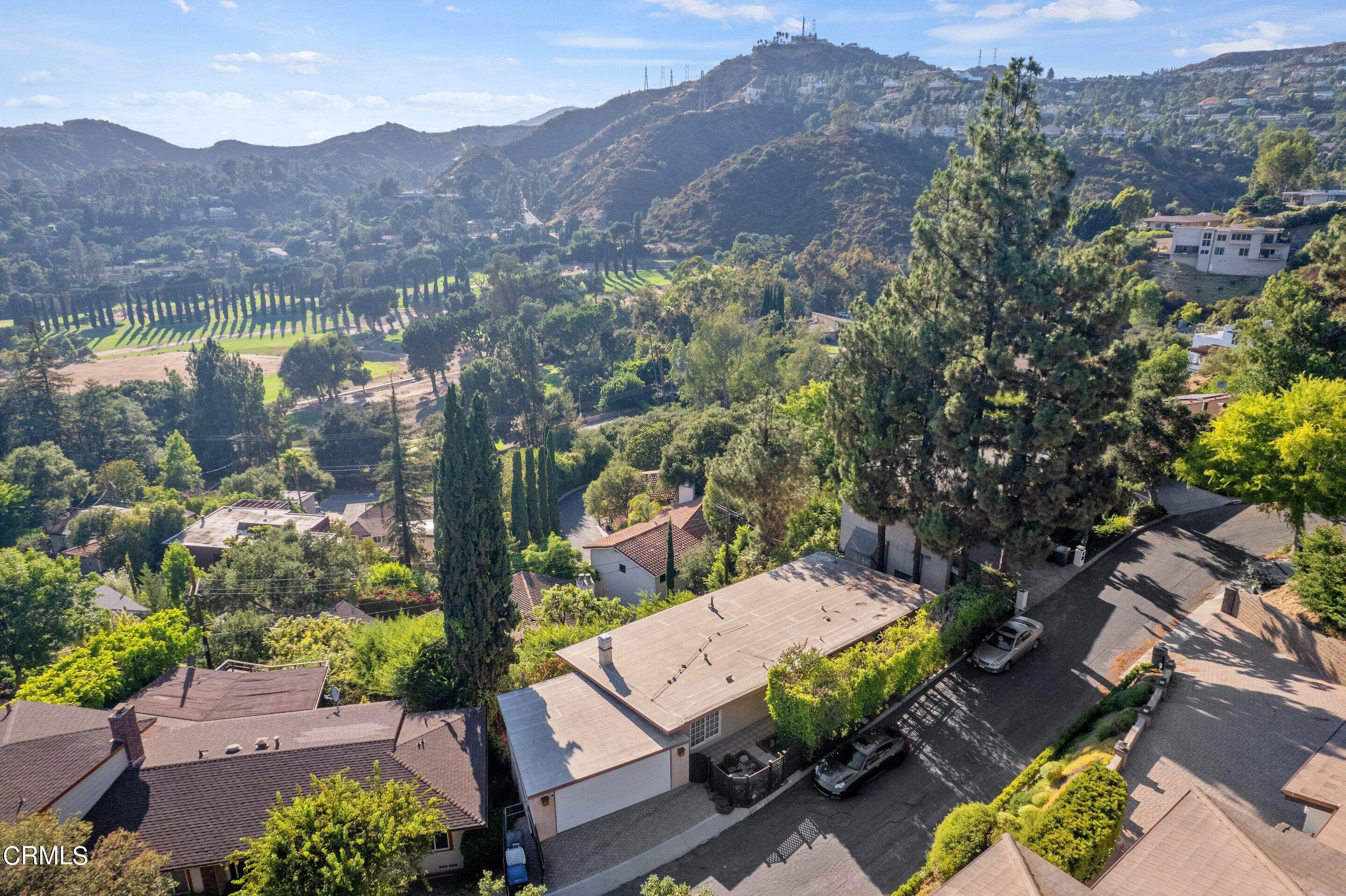 3170 Buckingham Road Glendale, CA 91206 - Photo 47 of 47 an aerial view of a house with yard and mountain view in back