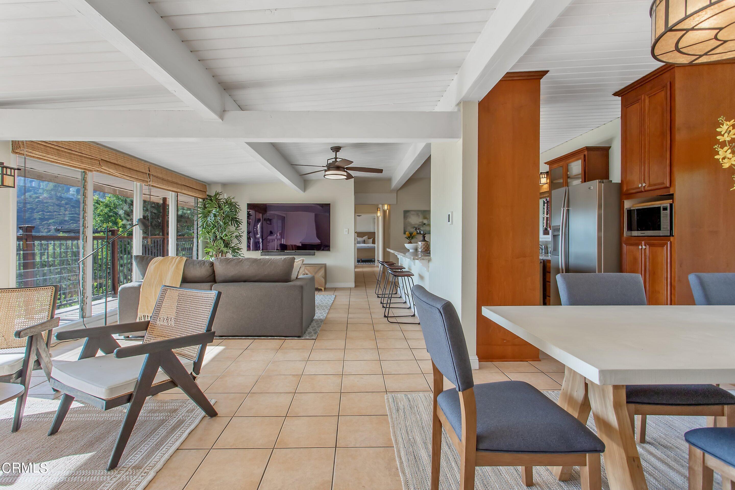 3170 Buckingham Road Glendale, CA 91206 - Photo 5 of 47 a living room with furniture a large window and stainless steel appliances