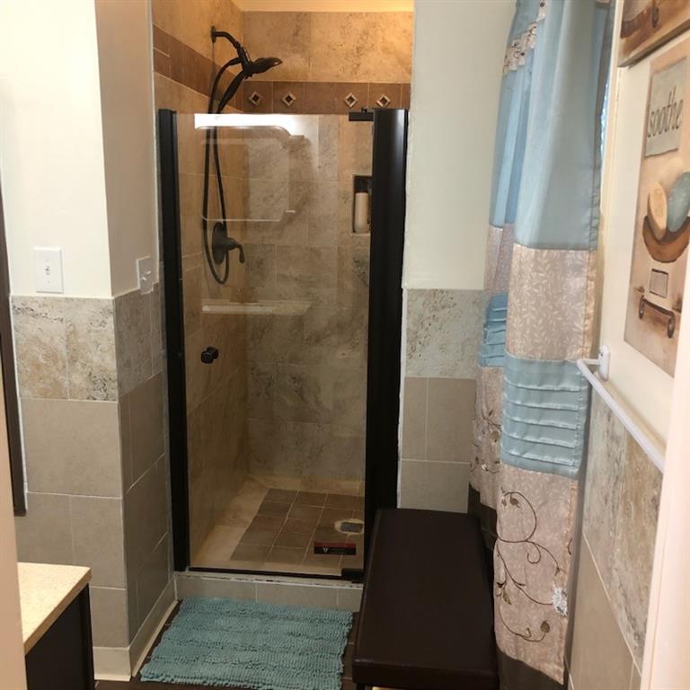 3960 Emerald N Drive Decatur, GA 30035 - Photo 7 of 8 a bathroom with a shower