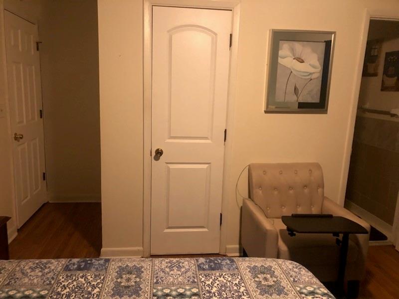 3960 Emerald N Drive Decatur, GA 30035 - Photo 8 of 8 a bedroom with a bed and hallway