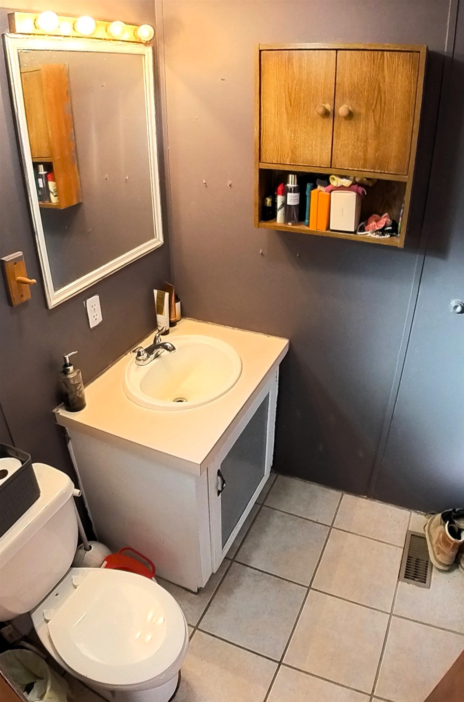 2108 1/2 H Road Fruita, CO 81521 - Photo 20 of 40 a bathroom with a sink mirror and toilet