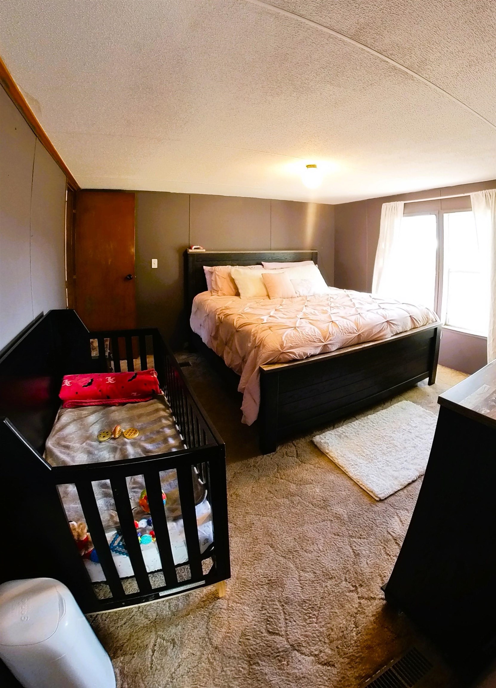 2108 1/2 H Road Fruita, CO 81521 - Photo 22 of 40 a bedroom with bed and window