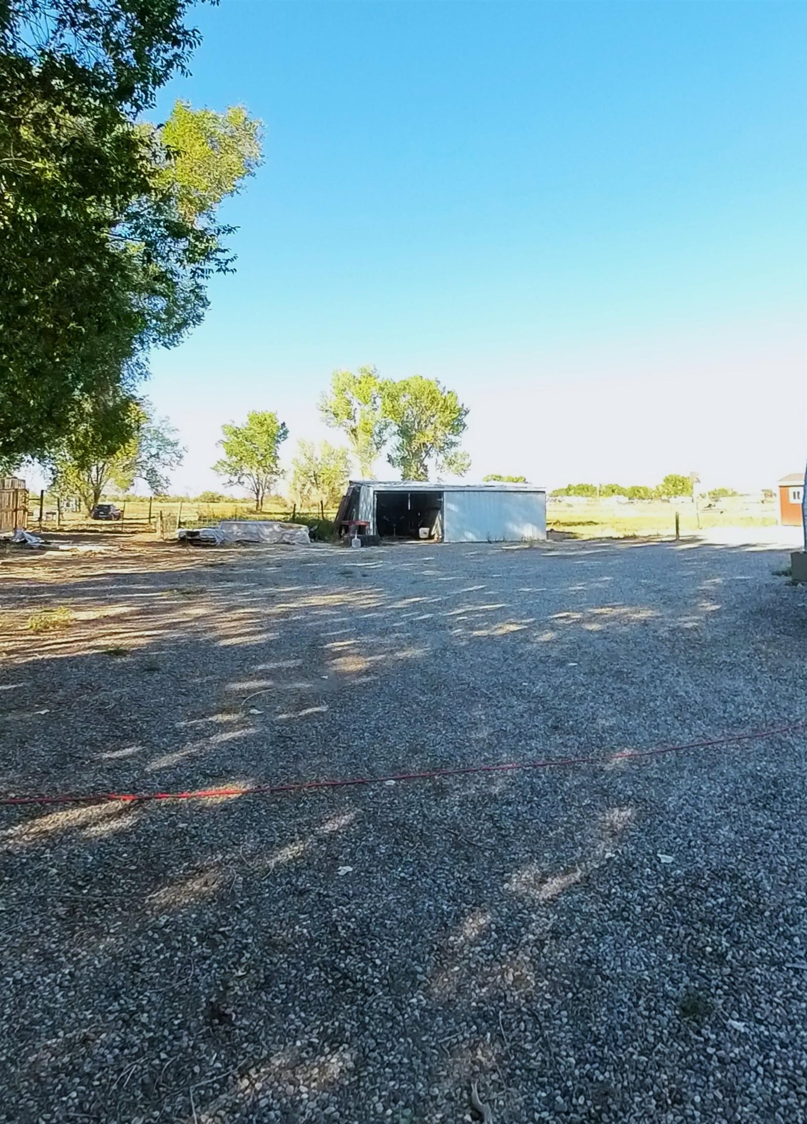 2108 1/2 H Road Fruita, CO 81521 - Photo 6 of 40 a view of a yard and ocean view
