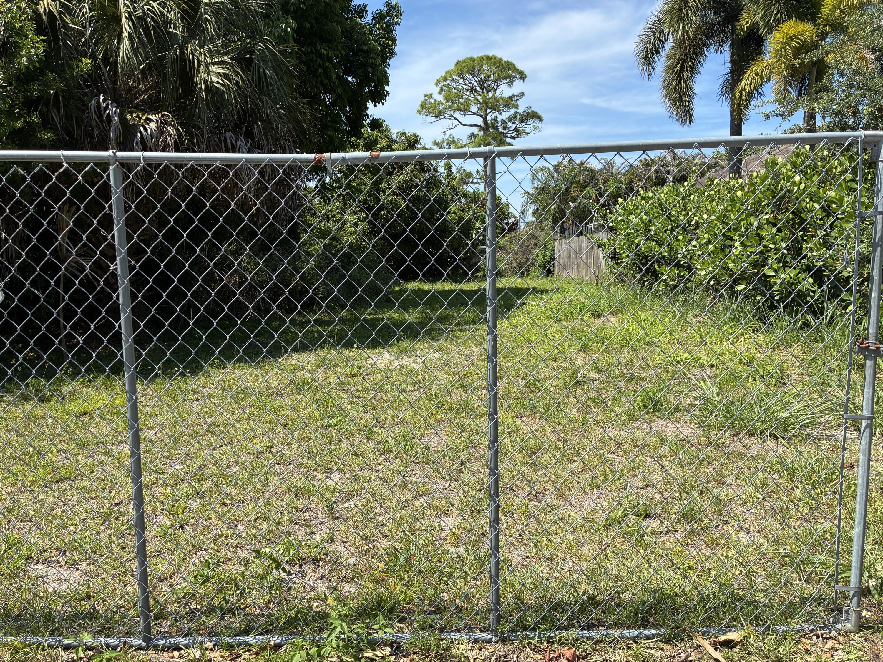 6755 1st Street Jupiter, FL 33458 - Photo 1 of 3 a view of outdoor space and garden