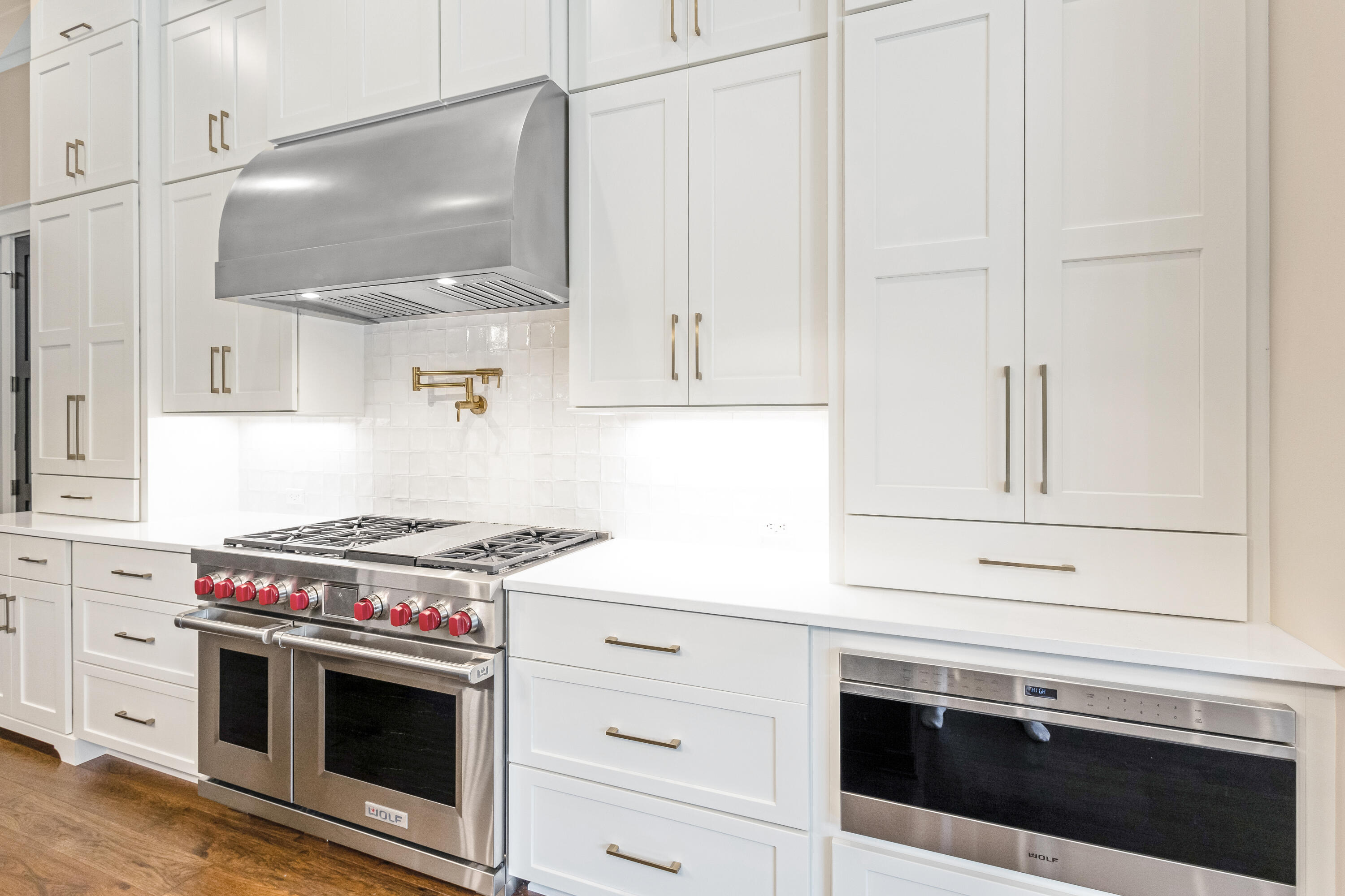 71 Clermont Cove Freeport, FL 32439 - Photo 14 of 73 a kitchen with granite countertop a stove and a sink