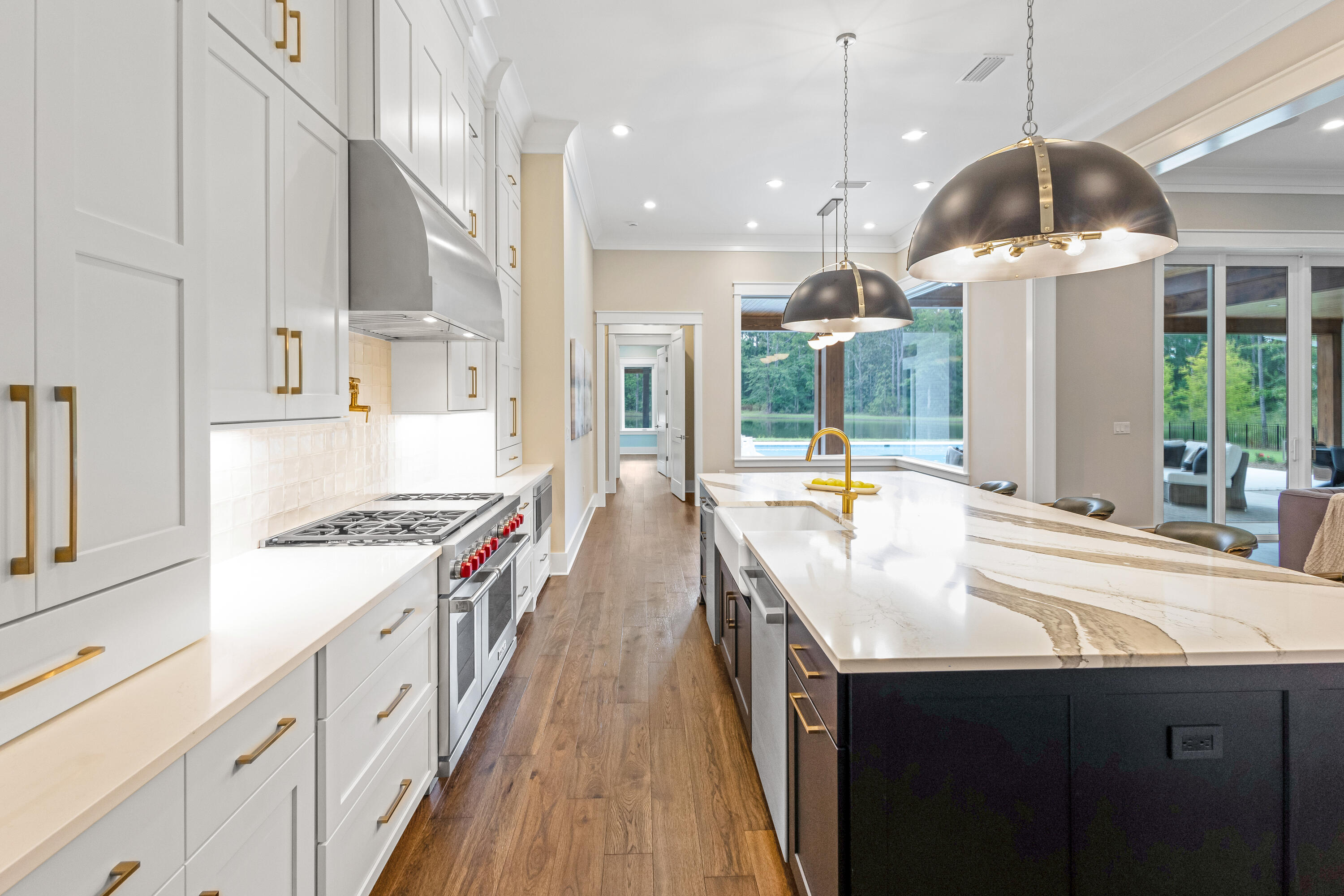 71 Clermont Cove Freeport, FL 32439 - Photo 17 of 73 a kitchen with stainless steel appliances granite countertop a sink a stove and a refrigerator