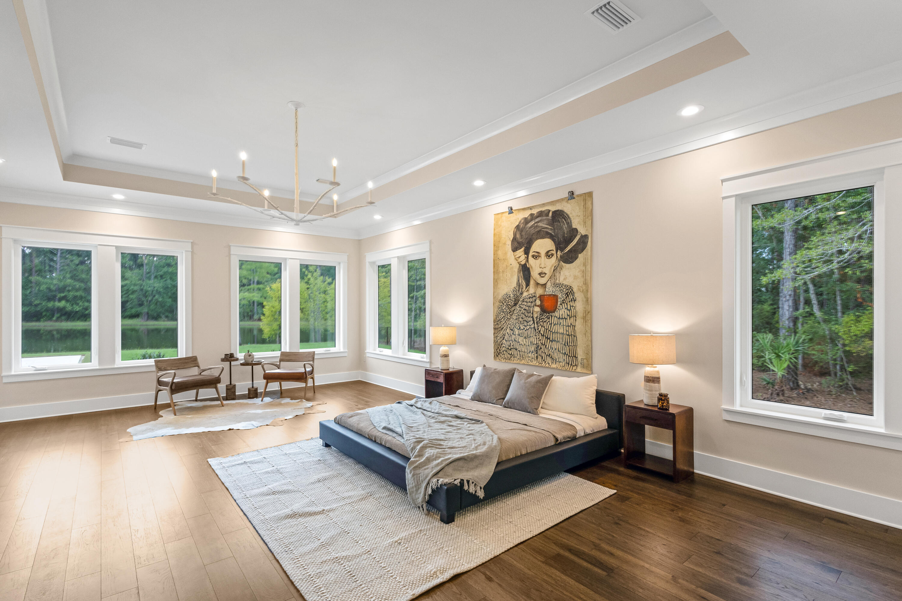 71 Clermont Cove Freeport, FL 32439 - Photo 22 of 73 a spacious bedroom with a large bed and a large window