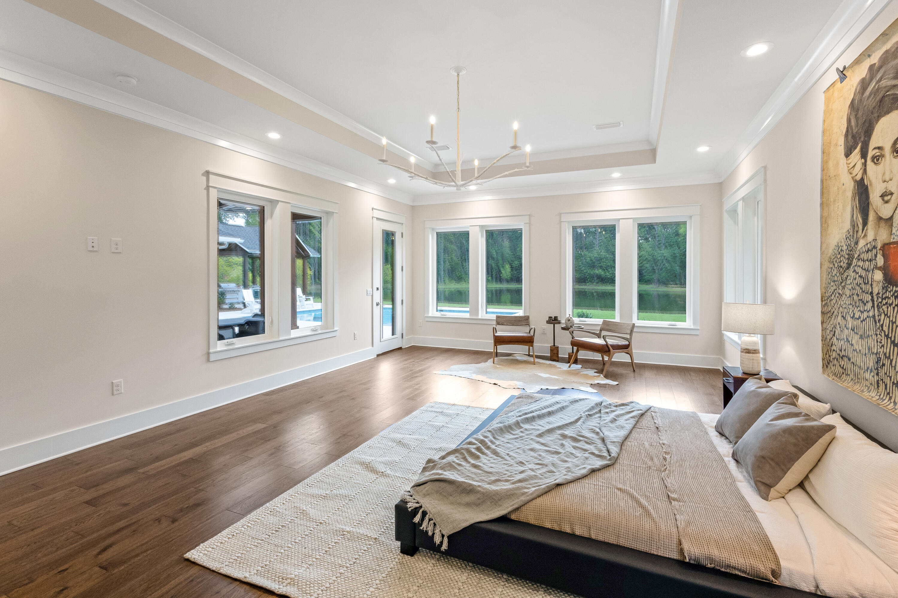71 Clermont Cove Freeport, FL 32439 - Photo 23 of 73 a bed sitting in a spacious bedroom next to a window