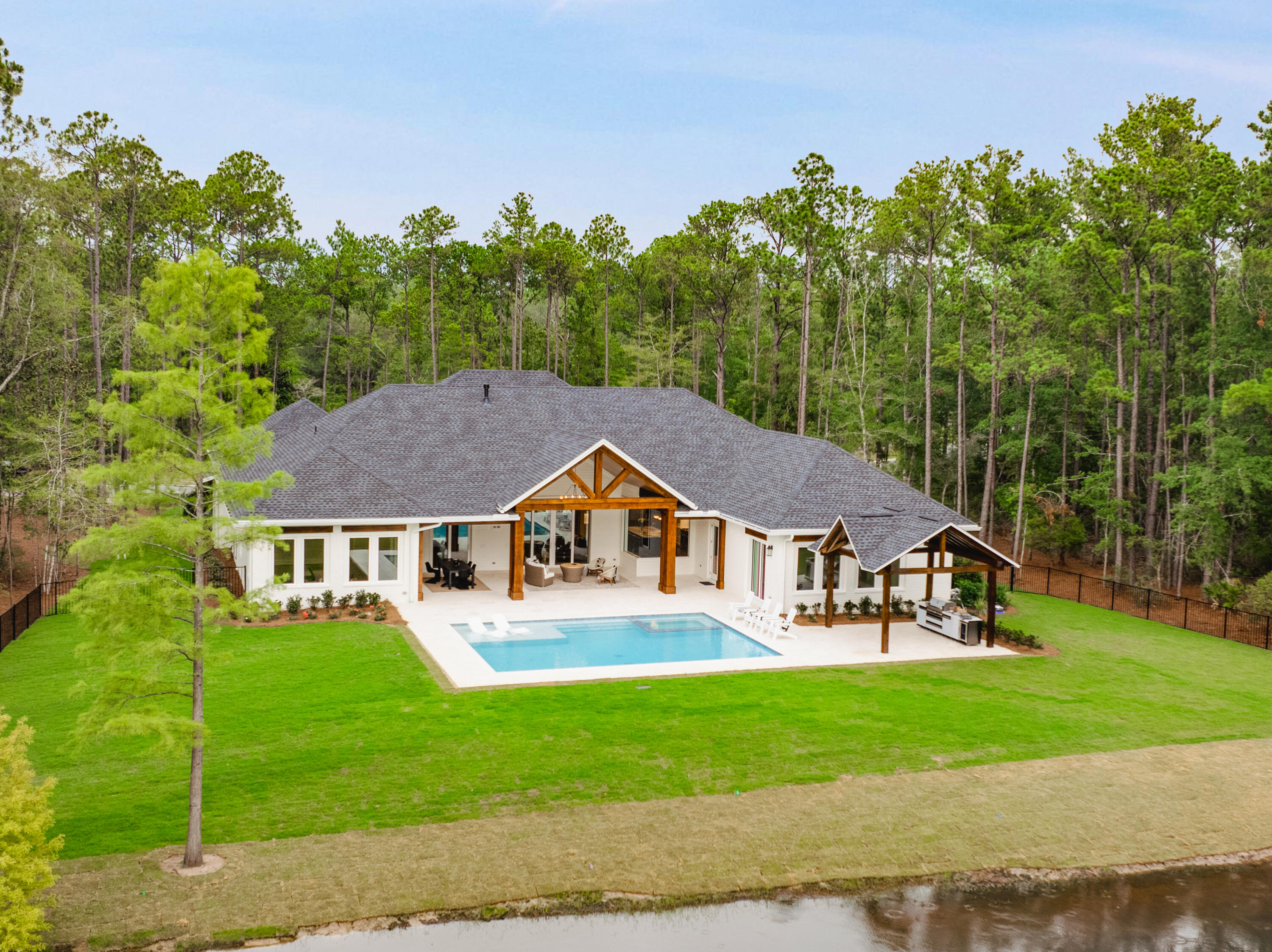 71 Clermont Cove Freeport, FL 32439 - Photo 47 of 73 a house that has a lot of plants in it
