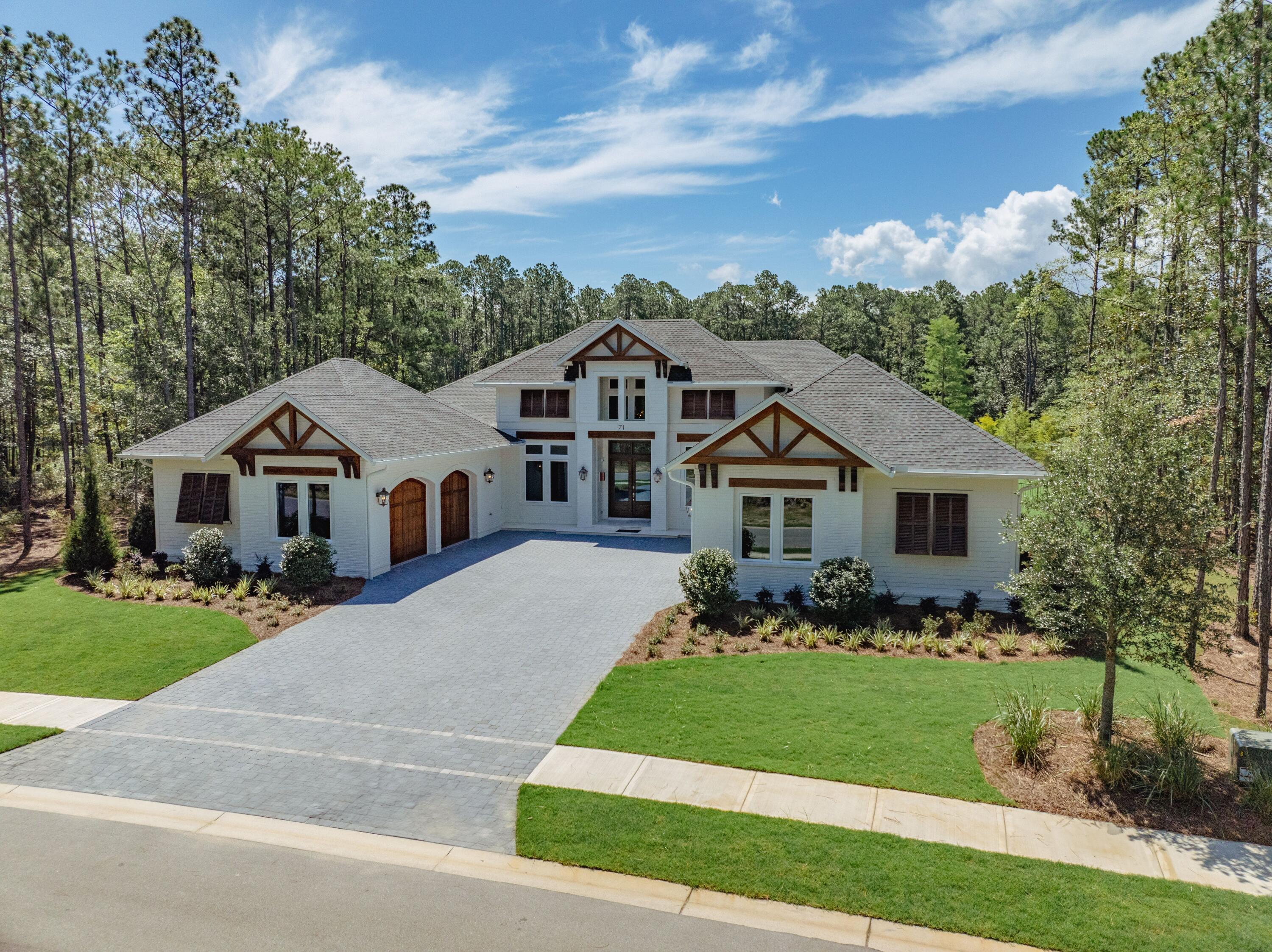 71 Clermont Cove Freeport, FL 32439 - Photo 51 of 73 front view of a house with a yard