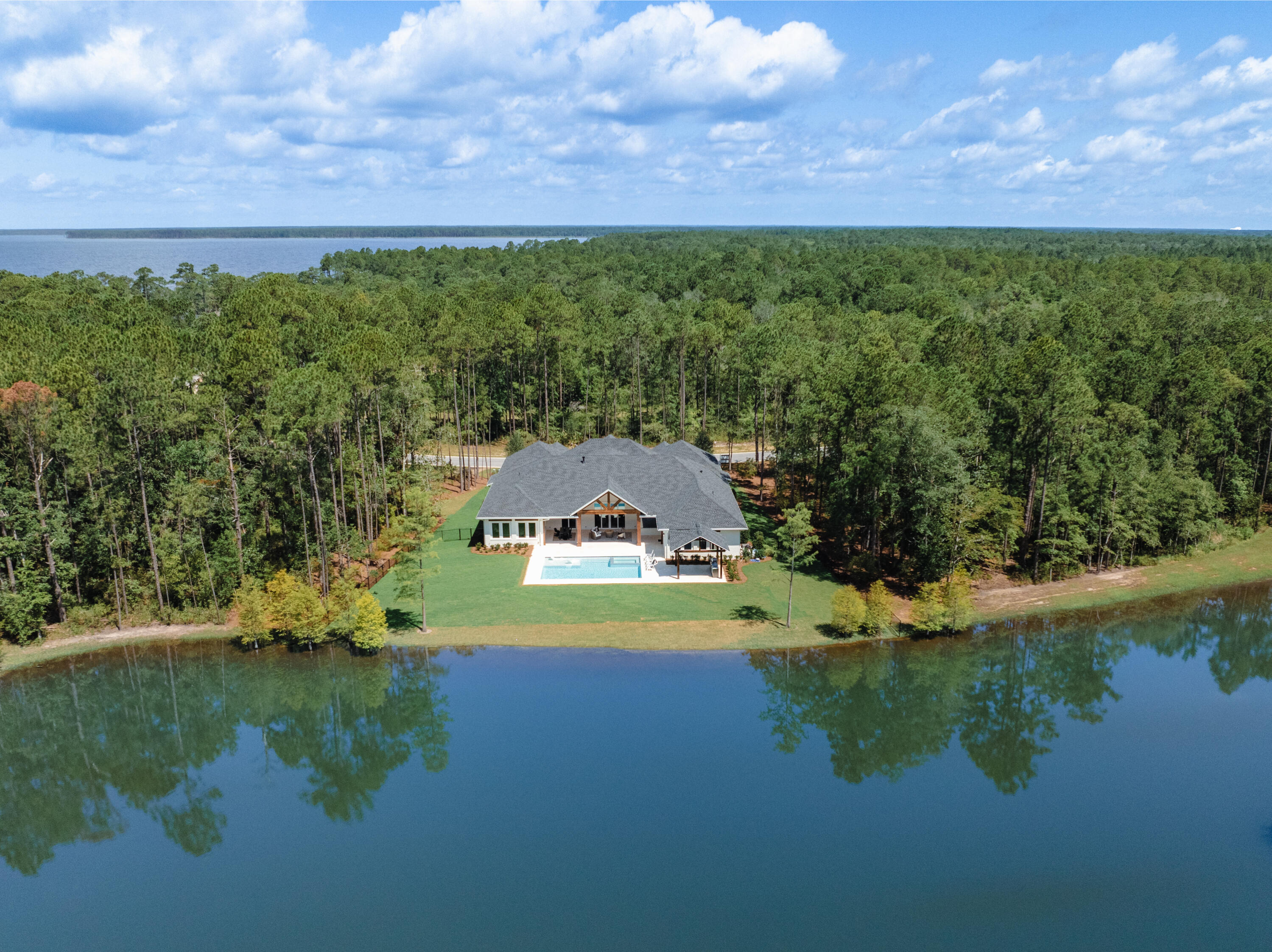 71 Clermont Cove Freeport, FL 32439 - Photo 52 of 73 a view of a lake in middle of the town