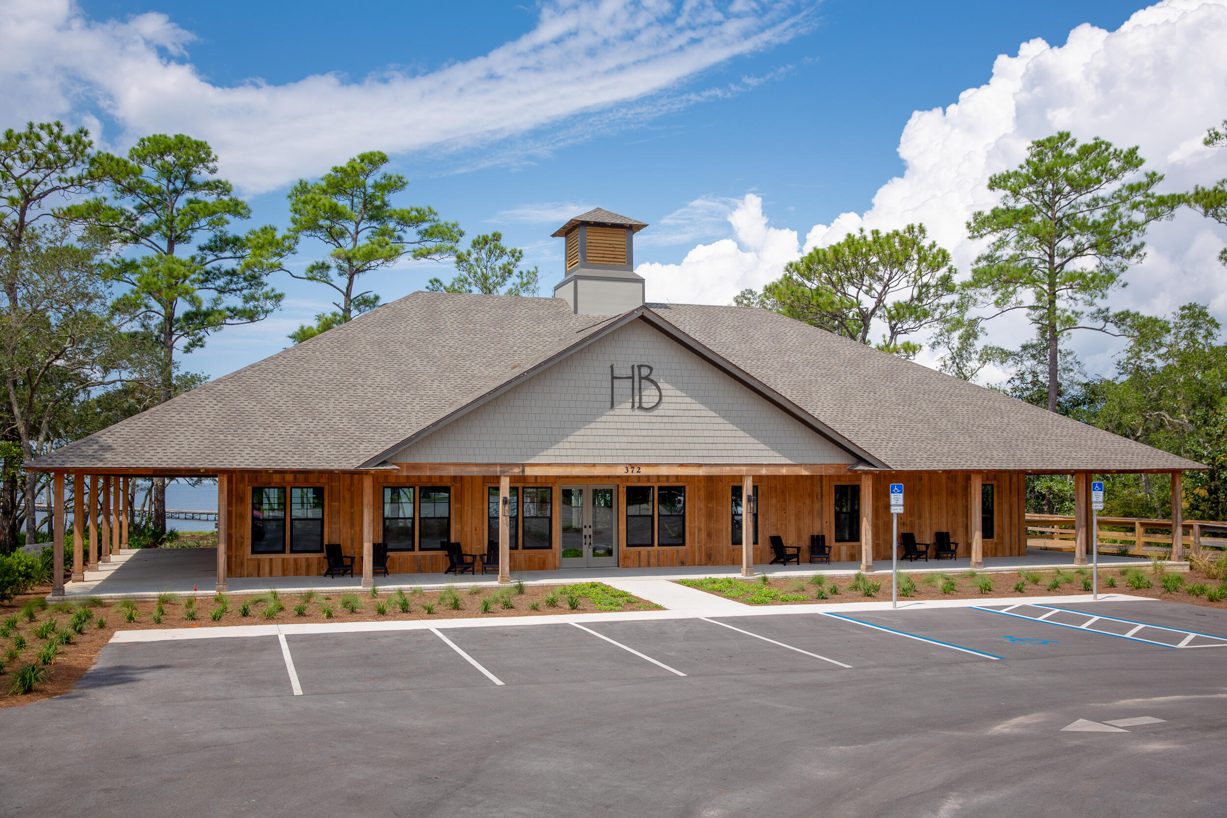 71 Clermont Cove Freeport, FL 32439 - Photo 56 of 73 a front view of a house with a garden
