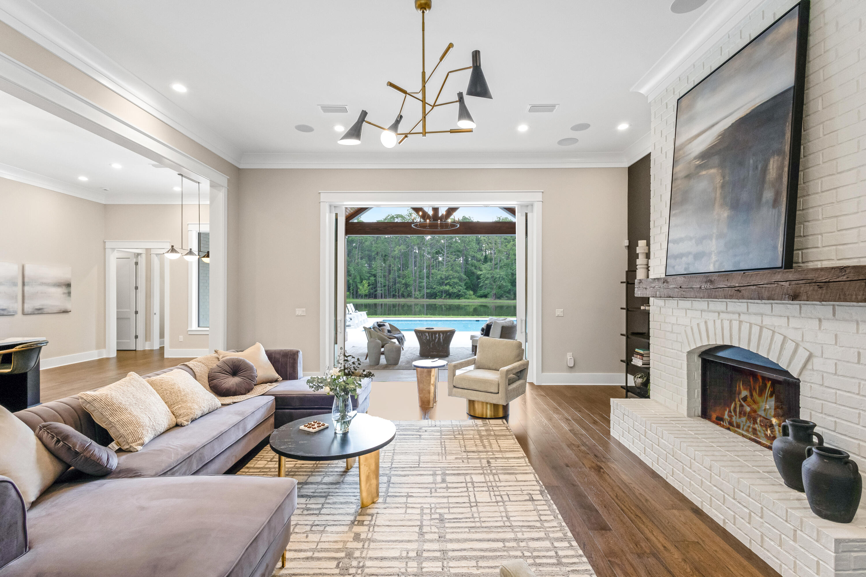71 Clermont Cove Freeport, FL 32439 - Photo 8 of 73 a living room with furniture and a fireplace
