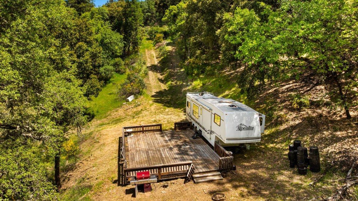 12921 Slate Creek Road Nevada City, CA 95959 - Photo 22 of 41 a view of building with outdoor space