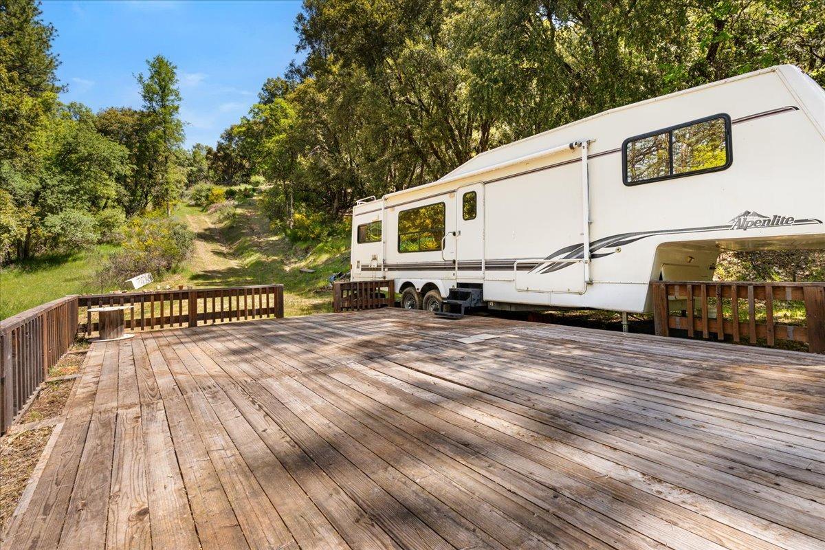 12921 Slate Creek Road Nevada City, CA 95959 - Photo 40 of 41 a view of a house with a yard