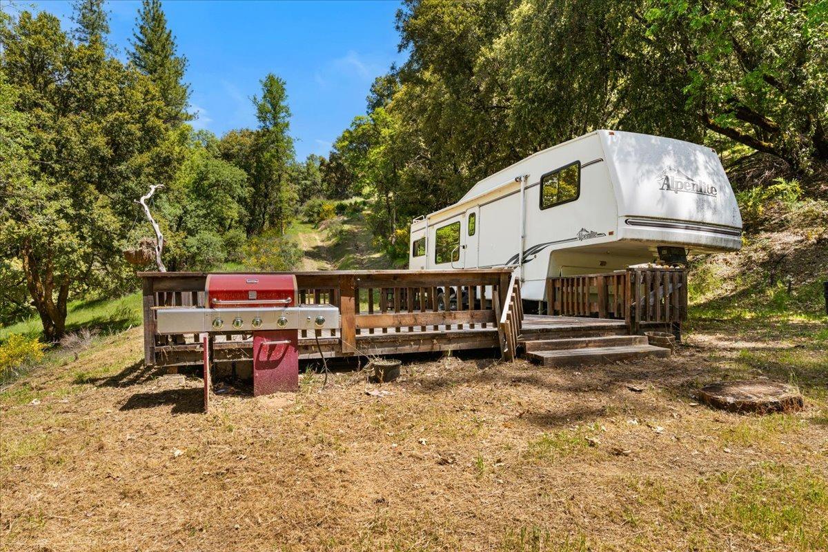 12921 Slate Creek Road Nevada City, CA 95959 - Photo 41 of 41 a view of a house with wooden fence