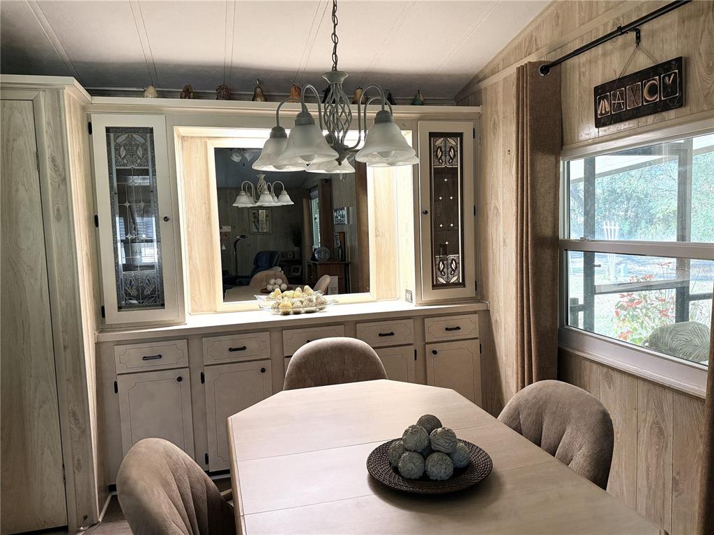 4418 Brave Lane St. Cloud, FL 34772 - Photo 13 of 29 a kitchen with a sink stove and refrigerator