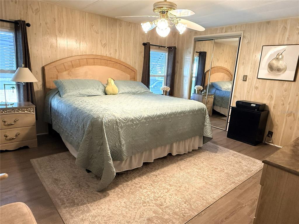 4418 Brave Lane St. Cloud, FL 34772 - Photo 14 of 29 a spacious bedroom with a bed and dresser