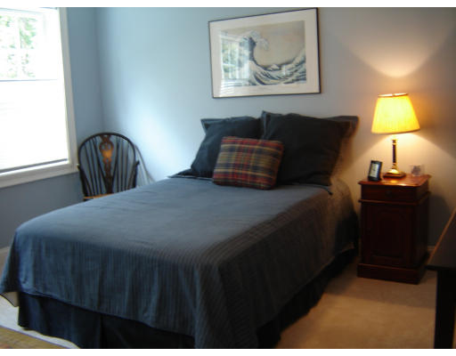 53 Two Ponds Road Belchertown, MA 01007 - Photo 15 of 19 a bedroom with a bed and a lamp on dresser