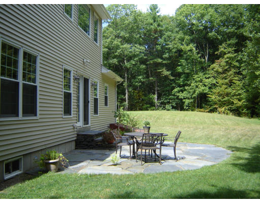53 Two Ponds Road Belchertown, MA 01007 - Photo 17 of 19 a view of a house with backyard and sitting area