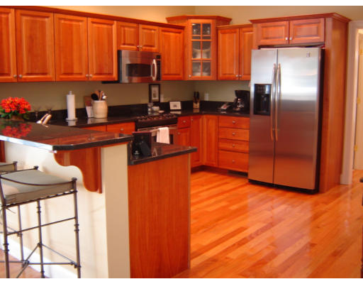 53 Two Ponds Road Belchertown, MA 01007 - Photo 5 of 19 a kitchen with stainless steel appliances granite countertop a refrigerator a stove and a sink