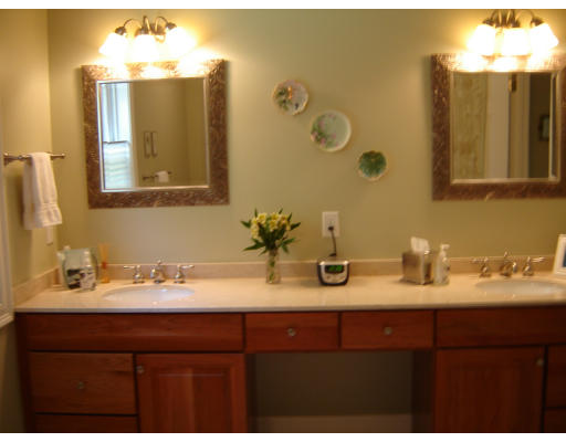 53 Two Ponds Road Belchertown, MA 01007 - Photo 9 of 19 a bathroom with a sink and a mirror