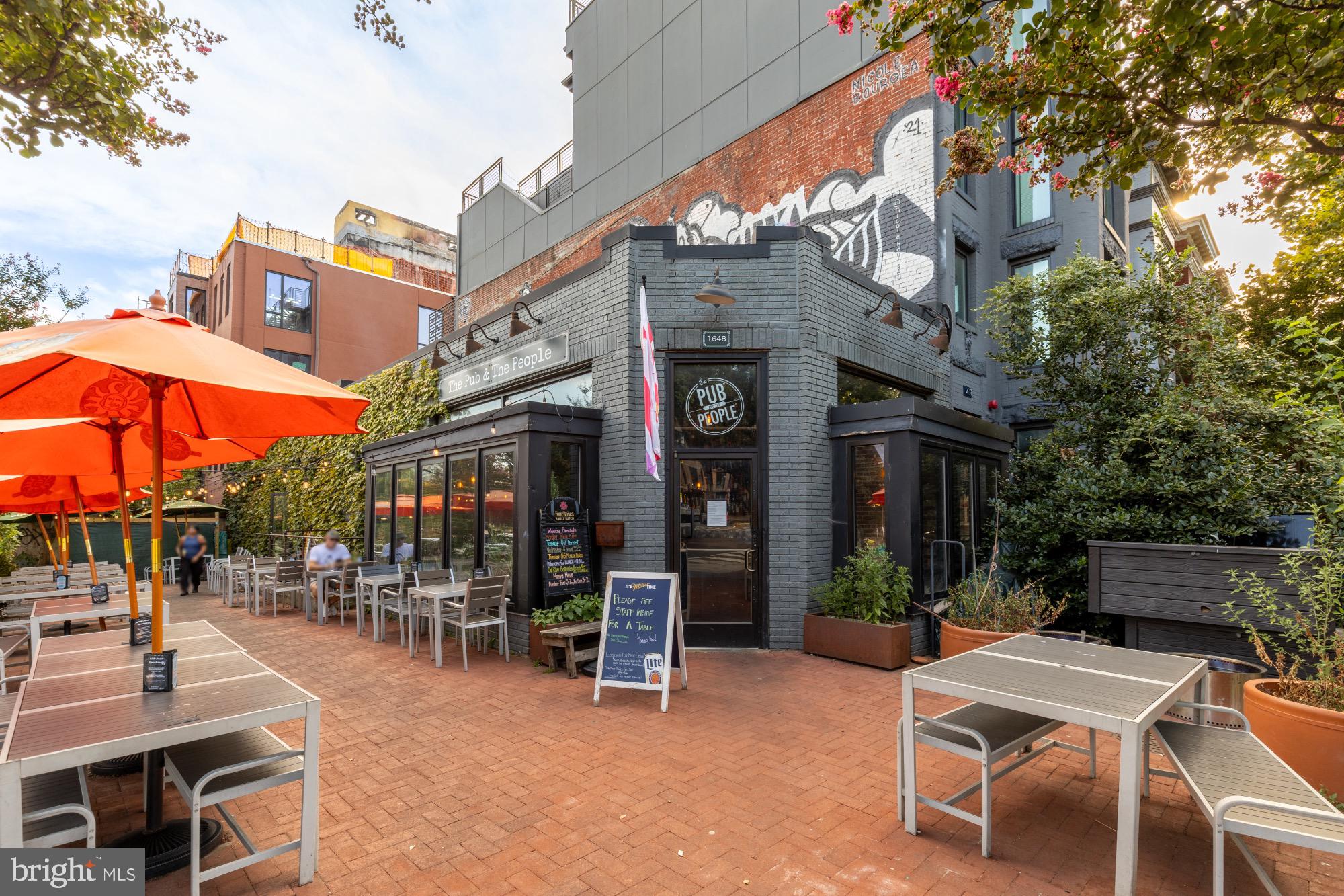54 W Street Northwest Washington, DC 20001 - Photo 60 of 68 Charming eatery with vibrant outdoor seating.