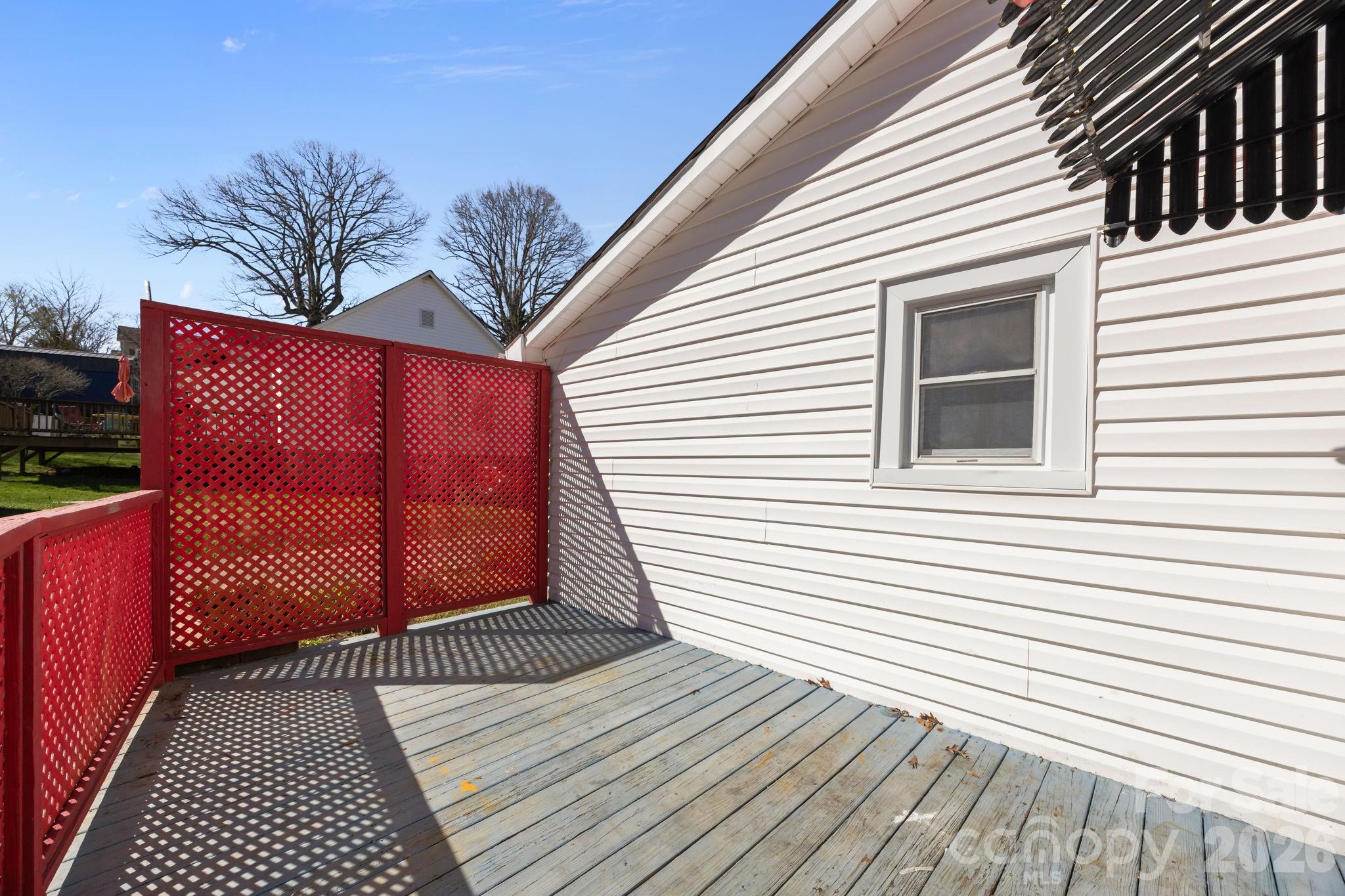 264 Church Street Marion, NC 28752 - Photo 17 of 20 a view of a house with a roof deck