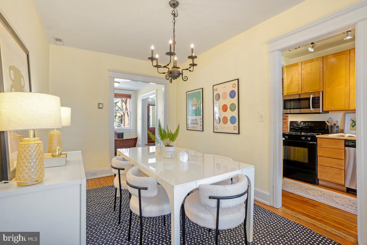 514 15th Street Southeast Washington, DC 20003 - Photo 12 of 36 a view of a dining room with furniture and a chandelier