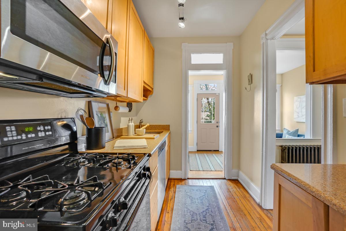 514 15th Street Southeast Washington, DC 20003 - Photo 14 of 36 a view of a kitchen with a sink and cabinets