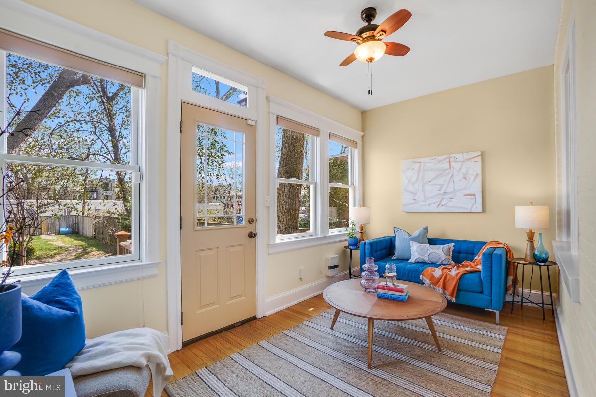 514 15th Street Southeast Washington, DC 20003 - Photo 15 of 36 a living room with furniture and a window