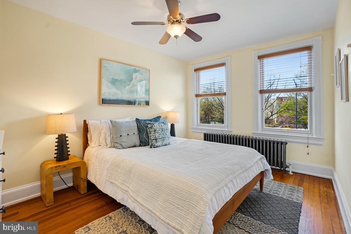 514 15th Street Southeast Washington, DC 20003 - Photo 17 of 36 a bedroom with a bed and a window