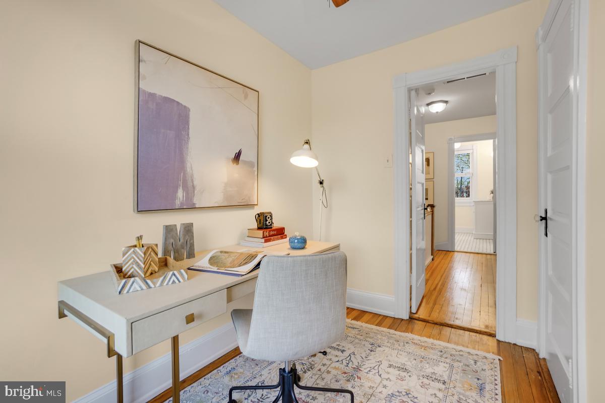 514 15th Street Southeast Washington, DC 20003 - Photo 25 of 36 a view of a hallway with furniture and wooden floor