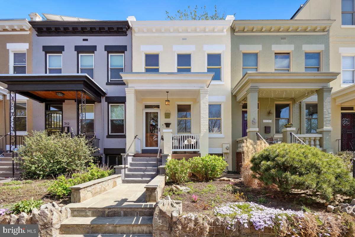 514 15th Street Southeast Washington, DC 20003 - Photo 3 of 36 front view of a brick house with a large window