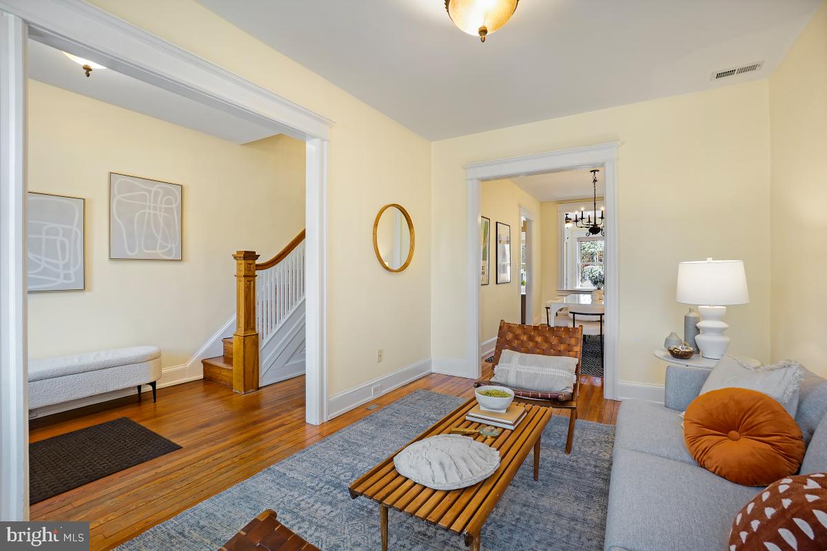 514 15th Street Southeast Washington, DC 20003 - Photo 6 of 36 a living room with furniture and a rug