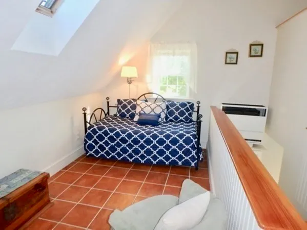 a room with furniture and a rug
