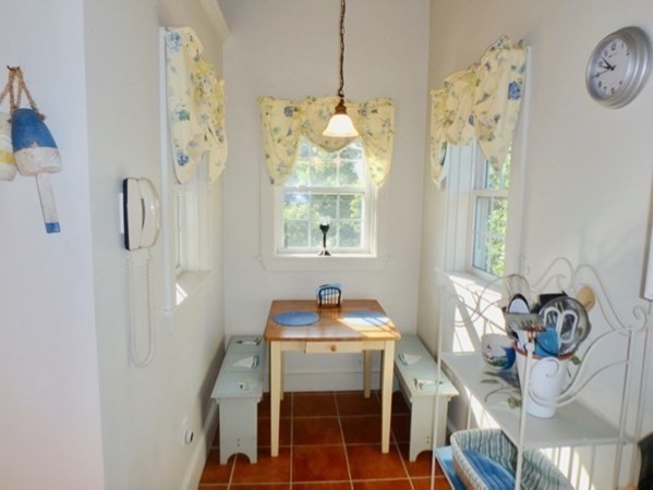 54 Schoolhouse Road Edgartown, MA 02539 - Photo 26 of 30 a bathroom with a sink mirror and window