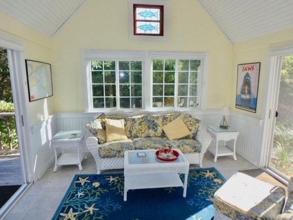 54 Schoolhouse Road Edgartown, MA 02539 - Photo 10 of 30 a living room with furniture and a window