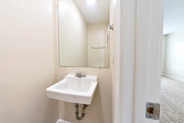 a view of a kitchen with a sink and dishwasher