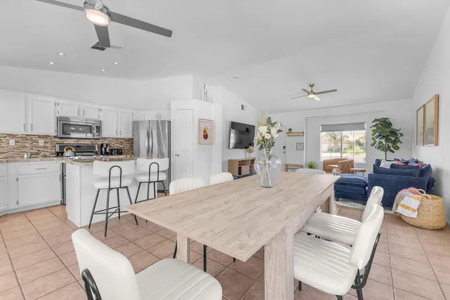 a view of kitchen with cabinets and wooden floor